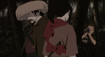 Movie still from “Millennium Actress” (2001), directed by Kô Matsuo – Two people standing next to each other near a forest; Close Up shot, Low angle