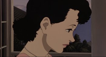 Movie still from “Millennium Actress” (2001), directed by Kô Matsuo – A woman's face is shown in a cartoon; Close Up shot, Low angle