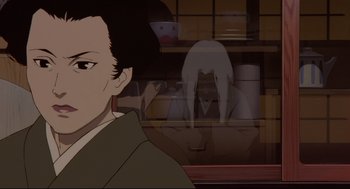 Movie still from “Millennium Actress” (2001), directed by Kô Matsuo – A man is looking at a ghost in a room; Close Up shot, Over the shoulder angle