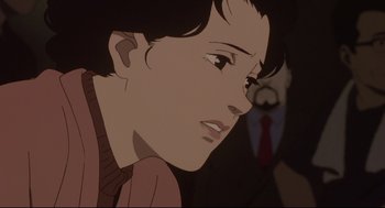 Movie still from “Millennium Actress” (2001), directed by Kô Matsuo – A person's face in a cartoon style; Close Up shot, Over the shoulder angle