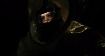 Movie still from “Mimic” (1997), directed by Guillermo del Toro – A person wearing a helmet in the dark; Close Up shot, Low angle