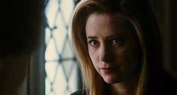 Movie still from “Mimic” (1997), directed by Guillermo del Toro – A person with long hair; Close Up shot, Low angle