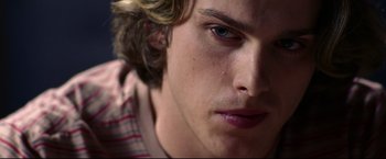 Movie still from “Miracle” (2004), directed by Gavin O'Connor – A young man's face; Close Up shot, Over the shoulder angle