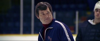 Movie still from “Miracle” (2004), directed by Gavin O'Connor – A person wearing a jacket; Close Up shot, Low angle