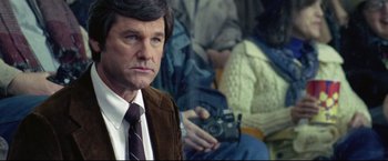 Movie still from “Miracle” (2004), directed by Gavin O'Connor – A person with a camera; Close Up shot, Over the shoulder angle
