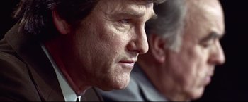 Movie still from “Miracle” (2004), directed by Gavin O'Connor – A man's face as he looks into the distance; Close Up shot, Low angle