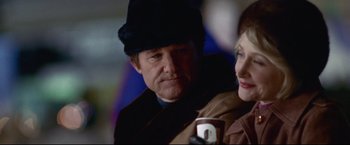 Movie still from “Miracle” (2004), directed by Gavin O'Connor – A person wearing a hat; Close Up shot, Over the shoulder angle