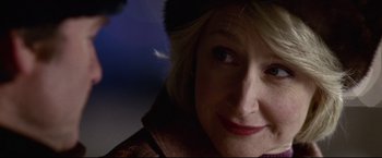 Movie still from “Miracle” (2004), directed by Gavin O'Connor – A person wearing a hat; Close Up shot, Over the shoulder angle