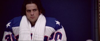 Movie still from “Miracle” (2004), directed by Gavin O'Connor – A person wearing a jersey; Close Up shot, Low angle