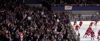 Movie still from “Miracle” (2004), directed by Gavin O'Connor – A large crowd of people in a stadium; Extreme Wide shot, High angle