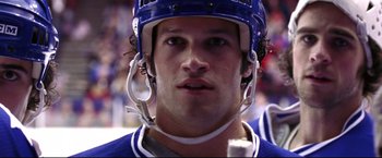 Movie still from “Miracle” (2004), directed by Gavin O'Connor – A hockey player wearing a helmet; Close Up shot, Low angle