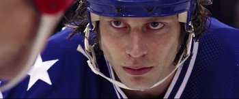 Movie still from “Miracle” (2004), directed by Gavin O'Connor – A hockey player's face; Close Up shot, Low angle