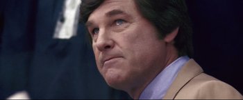Movie still from “Miracle” (2004), directed by Gavin O'Connor – A man's face as he looks off into the distance; Close Up shot, Low angle