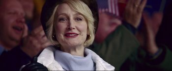 Movie still from “Miracle” (2004), directed by Gavin O'Connor – A person wearing a jacket; Close Up shot, Over the shoulder angle