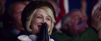 Movie still from “Miracle” (2004), directed by Gavin O'Connor – A person wearing gloves and a hat; Close Up shot, Low angle