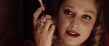 Movie still from “Miracle at St. Anna” (2008), directed by Spike Lee – A person talking on a cell phone; Close Up shot, Over the shoulder angle