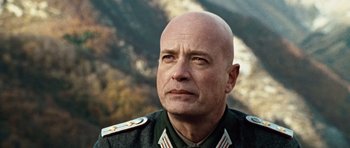 Movie still from “Miracle at St. Anna” (2008), directed by Spike Lee – A man in military uniform looking into the distance; Close Up shot, Low angle