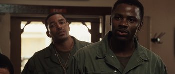 Movie still from “Miracle at St. Anna” (2008), directed by Spike Lee – A couple of men standing next to each other; Close Up shot, Over the shoulder angle