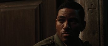 Movie still from “Miracle at St. Anna” (2008), directed by Spike Lee – A person wearing a jacket; Close Up shot, High angle