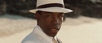 Movie still from “Miracle at St. Anna” (2008), directed by Spike Lee – A person wearing a white hat; Close Up shot, Over the shoulder angle