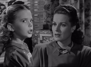 Movie still from “Miracle on 34th Street” (1947), directed by George Seaton – A woman and a young girl are looking at each other; Close Up shot, Over the shoulder angle