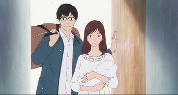 Movie still from “Mirai” (2018), directed by Mamoru Hosoda – A man and a woman standing next to each other holding a baby; Medium shot, Over the shoulder angle