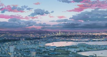 Movie still from “Mirai” (2018), directed by Mamoru Hosoda – An illustration of a city skyline at night; Extreme Wide shot, High angle