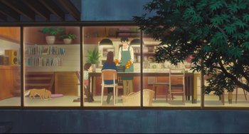 Movie still from “Mirai” (2018), directed by Mamoru Hosoda – An illustration of a woman and a man in a kitchen; Wide shot, Over the shoulder angle