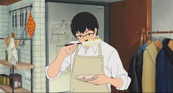 Movie still from “Mirai” (2018), directed by Mamoru Hosoda – A cartoon of a man eating food while wearing an apron; Medium shot, High angle