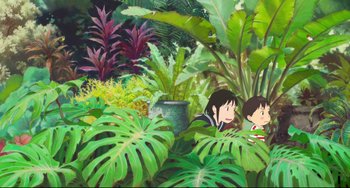 Movie still from “Mirai” (2018), directed by Mamoru Hosoda – Two children are hiding in the bushes in the jungle; Extreme Wide shot, High angle
