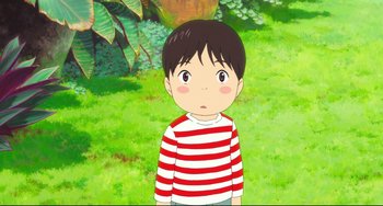 Movie still from “Mirai” (2018), directed by Mamoru Hosoda – A boy in striped shirt standing in a field; Medium shot, High angle