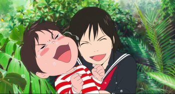 Movie still from “Mirai” (2018), directed by Mamoru Hosoda – Two young children are smiling and laughing together; Close Up shot, Low angle