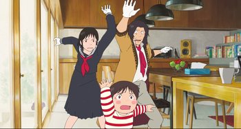 Movie still from “Mirai” (2018), directed by Mamoru Hosoda – A group of three people in a kitchen; Medium shot, Low angle