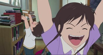 Movie still from “Mirai” (2018), directed by Mamoru Hosoda – Two children are playing with books in a room; Medium shot, Low angle