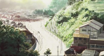 Movie still from “Mirai” (2018), directed by Mamoru Hosoda – An artist's rendering of an urban area with a lot of trees and buildings; Extreme Wide shot, High angle