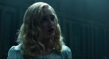 Movie still from “Miss Peregrine's Home for Peculiar Children” (2016), directed by Tim Burton – A woman with long blonde hair looking to her left; Close Up shot, Low angle