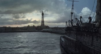 Movie still from “Miss Peregrine's Home for Peculiar Children” (2016), directed by Tim Burton – A large body of water near a city; Extreme Wide shot, High angle