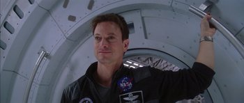 Movie still from “Mission to Mars” (2000), directed by Brian De Palma – A person wearing a space suit; Close Up shot, Low angle