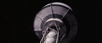 Movie still from “Mission to Mars” (2000), directed by Brian De Palma – A very large radio telescope in the night sky; Extreme Wide shot, Low angle