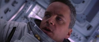 Movie still from “Mission to Mars” (2000), directed by Brian De Palma – A person wearing a space suit; Close Up shot, Low angle