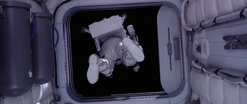 Movie still from “Mission to Mars” (2000), directed by Brian De Palma – An image of an astronaut floating in the space; Wide shot, Overhead angle