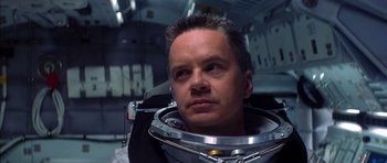 Movie still from “Mission to Mars” (2000), directed by Brian De Palma – A person wearing a space suit; Close Up shot, Overhead angle