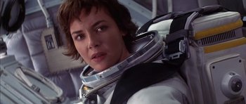 Movie still from “Mission to Mars” (2000), directed by Brian De Palma – A person wearing a space suit; Close Up shot, Over the shoulder angle