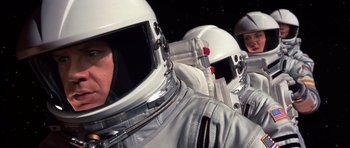 Movie still from “Mission to Mars” (2000), directed by Brian De Palma – A group of people in spacesuits standing next to each other; Close Up shot, Low angle