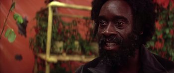 Movie still from “Mission to Mars” (2000), directed by Brian De Palma – A person with a beard; Close Up shot, Low angle