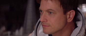 Movie still from “Mission to Mars” (2000), directed by Brian De Palma – A man's face as he looks into the distance; Close Up shot, Over the shoulder angle