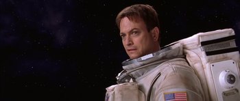 Movie still from “Mission to Mars” (2000), directed by Brian De Palma – A person wearing a space suit; Close Up shot, Low angle