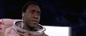 Movie still from “Mission to Mars” (2000), directed by Brian De Palma – A person wearing a space suit; Close Up shot, Low angle