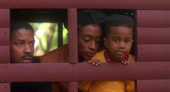 Movie still from “Mo' Better Blues” (1990), directed by Spike Lee – A woman and a child looking over a railing; Close Up shot, High angle