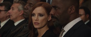 Movie still from “Molly's Game” (2017), directed by Aaron Sorkin – A woman and two men in a room; Close Up shot, Over the shoulder angle